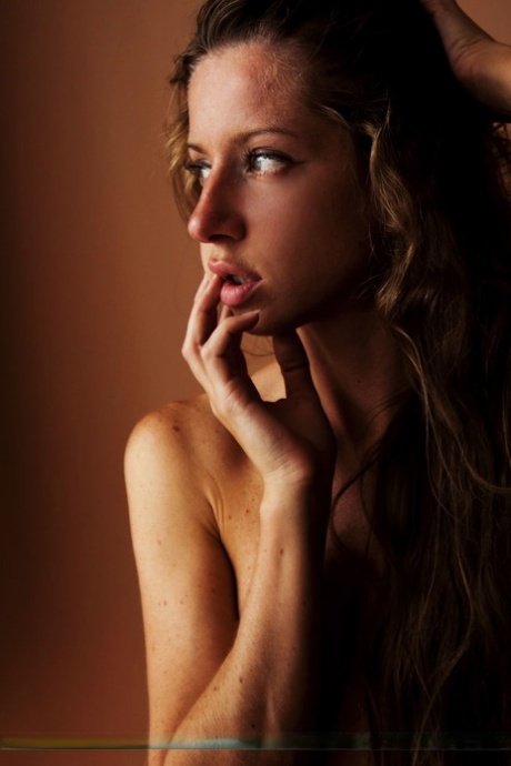 Slender teen Mika A reveals her flat chest while getting bare naked 71475090