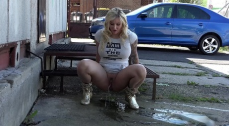 Chubby blonde girl in tight short skirt squats to take a hot piss in pubic 77567728