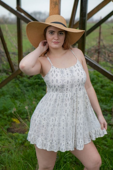 Country girl lifts her dress for naked upskirt showing bald twat and ass 26228319
