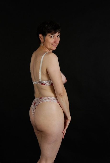 Horny granny with small saggy boobs peels red lingerie to pose naked 93726839