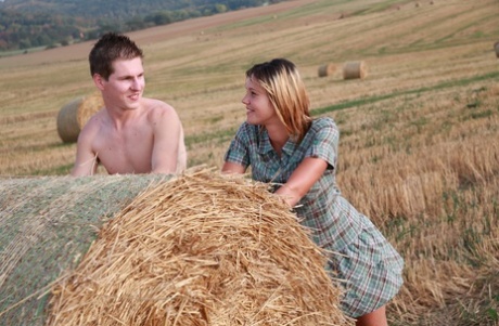 Horny teenagers have sex against a round bale in a farmer's field 82160667