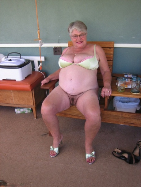 Old lady Girdle Goddess shakes her big butt while on a veranda 95522497