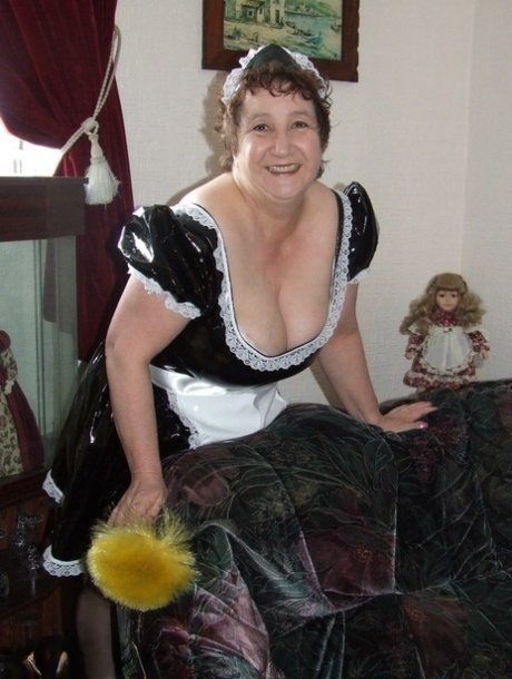 Mature maid Kinky Carol gets naked at work in her stockings