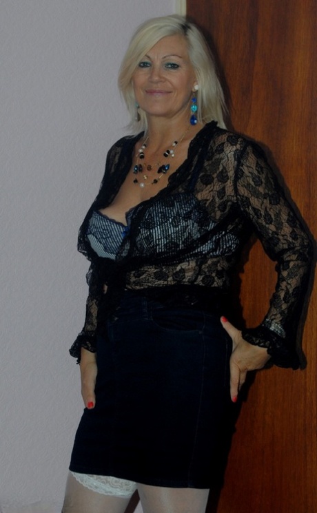 Older mature Platinum Blonde undressing to pose in her sexy lace lingerie 75171053