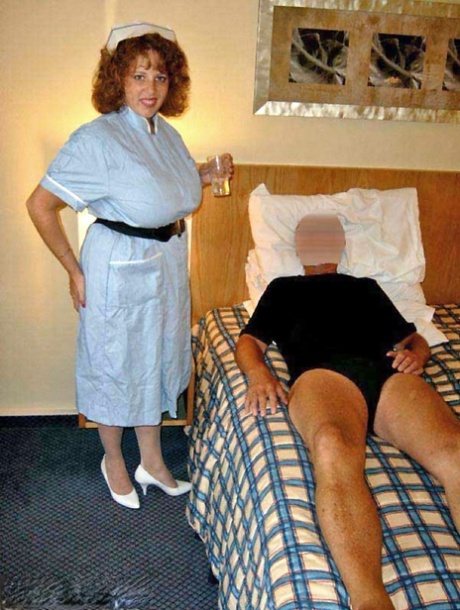 Older UK nurse Curvy Claire exposes her big tits before playing with a cock 70420979