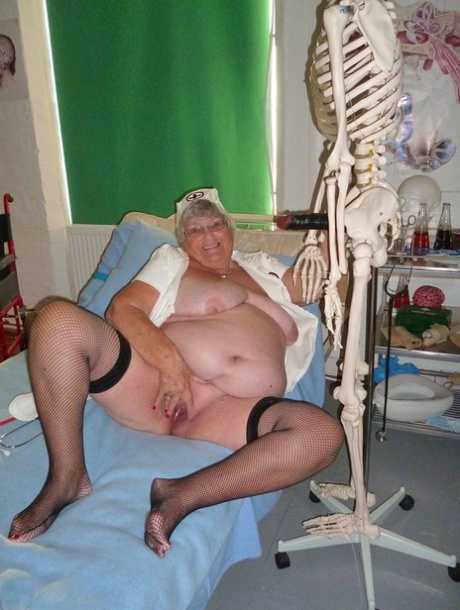Fat old nurse Grandma Libby attaches a dildo to a skeleton for sexual relief 89405339