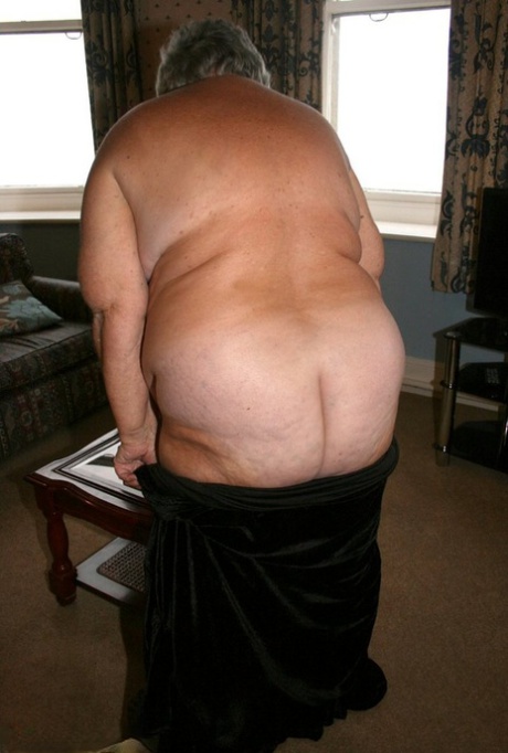 Obese UK senior citizen Grandma Libby goes naked on a loveseat in stockings 34873666
