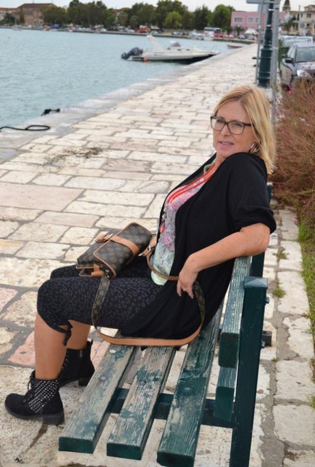 Hugely busty mature slut Chrissy swims and lounges at the beach stark naked 99104665
