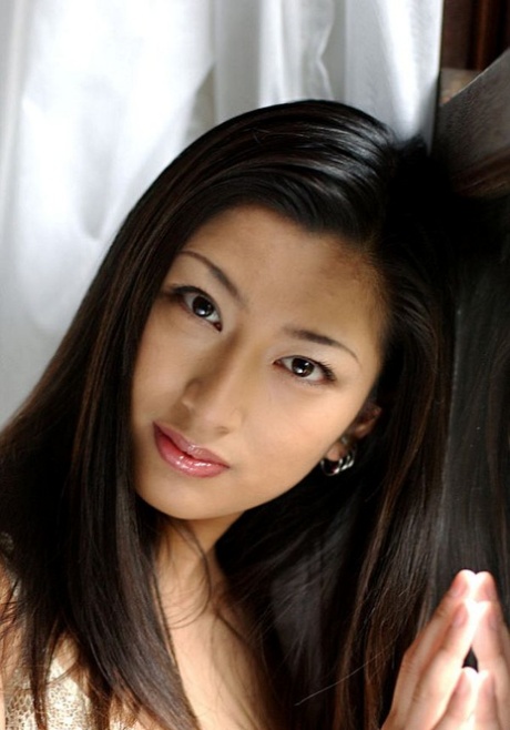 Japanese girl Ran Asakawa removes white bra and panties by an open window 75300952