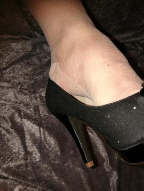 Horny granny Caro hikes up her dress to masturbate in nylons and heels 44847441