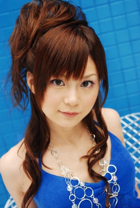 Young looking Japanese girl Anna Watanabe models non nude in shorts 68975918