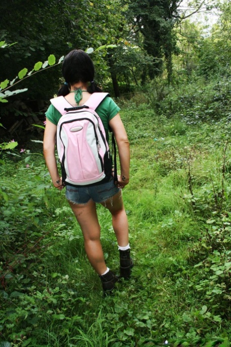 Dark haired woman Elizabeth Lawrence has interracial sex amid greenery 70713004