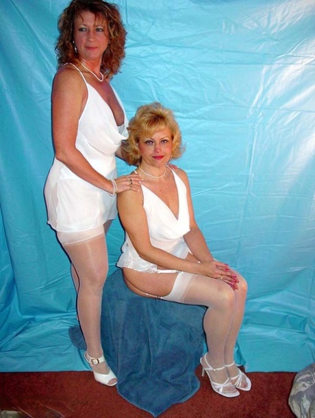 Mature woman Devlynn kisses her lesbian lover during foreplay action 84508052