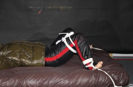 White girl is masturbated against her will in a down jacket and nylon pants 16685324