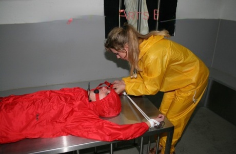 White girl is tied up on a stainless steel bondage table in nylon clothing 59104268