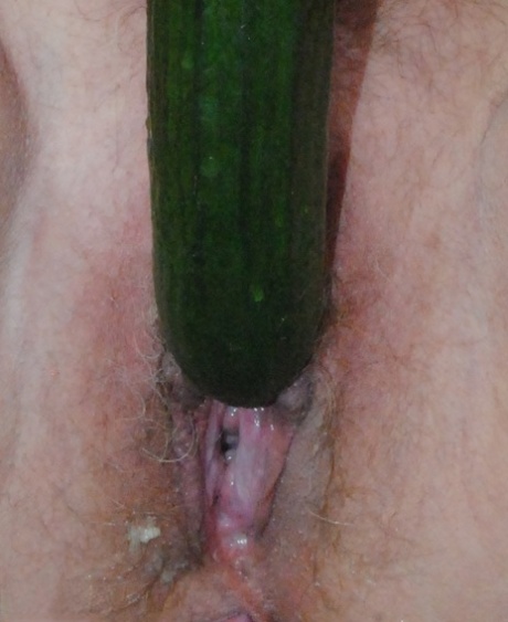 Older blonde Dimonty peals a banana before taking a cucumber to her pussy 92951138