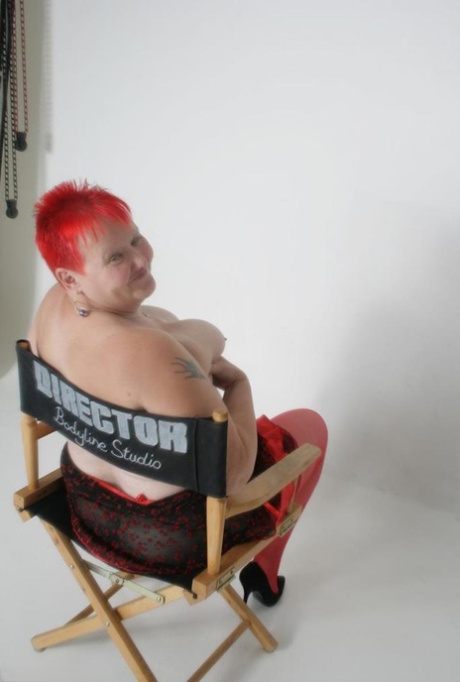 Fat granny Valgasmic Exposed sports short red hair while showing her huge ass 98039685