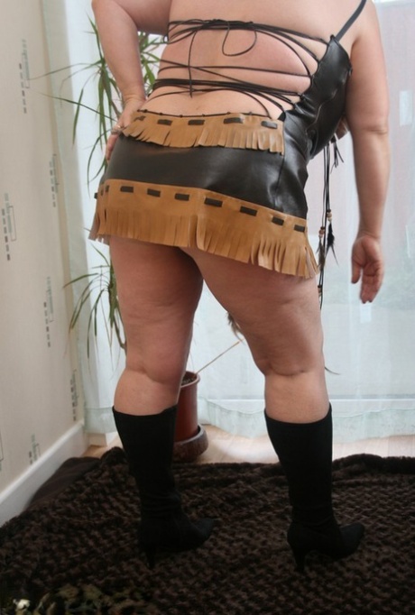 Sick mature woman Kinky Carol models leather lingerie in black boots 66899177