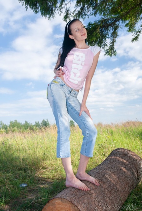 Dark-haired 18-year-old Sasha S gets totally naked on a wooden platform 48344506