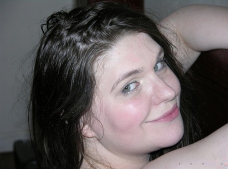 Brunette BBW Eliza Eliza holds her big ass while showing her naked pussy 84106491