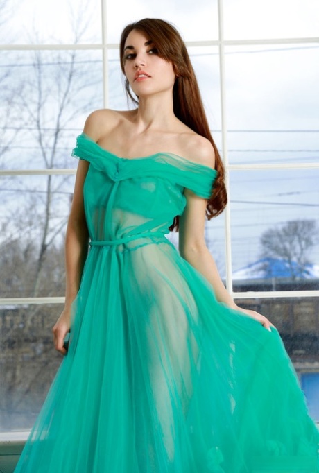 Sweet brunette teen Rosie Lauren discards an elegant gown to model naked 61820220
