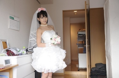 Pretty Japanese bride Ruri Narumiya takes off her wedding dress to pose nude 67551456