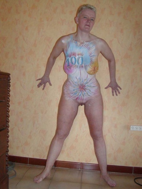 Mature blonde Tiffany Pearl has her naked body decorated in body paint 77068525
