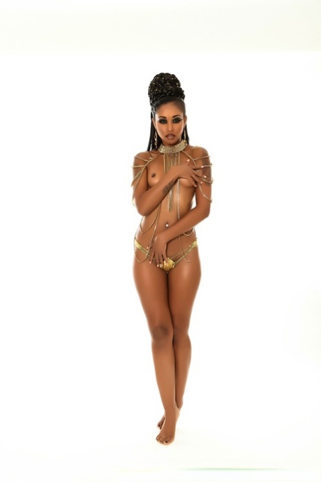 Scary ebony MILF Skin Diamond shows her fangs while posing her hot naked body 35526559