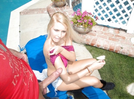 Young blonde girl Vanessa Cage giving ball licking BJ beside swimming pool 70915294