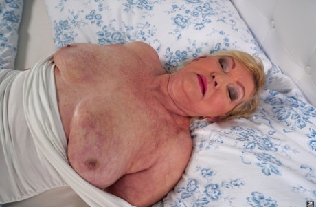 Thick grandmother Irene bares her saggy boobs before showing her hairy muff 38755088
