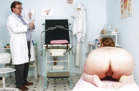 Close up shots of Plump Mature's moist pussy spread wide at the gyno 63864071